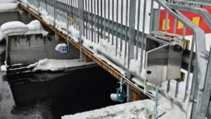 RQ-30+ mounted beneath a bridge
